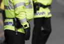 A woman was hospitalised during the incident - and a police officer was subsequently racially abused