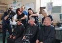 Clients of the charity CIRDIC haircuts at a pamper day in collaboration with More Lord London at the charity centre at St Saviours Church Hall in Coley. Credit: CIRDIC