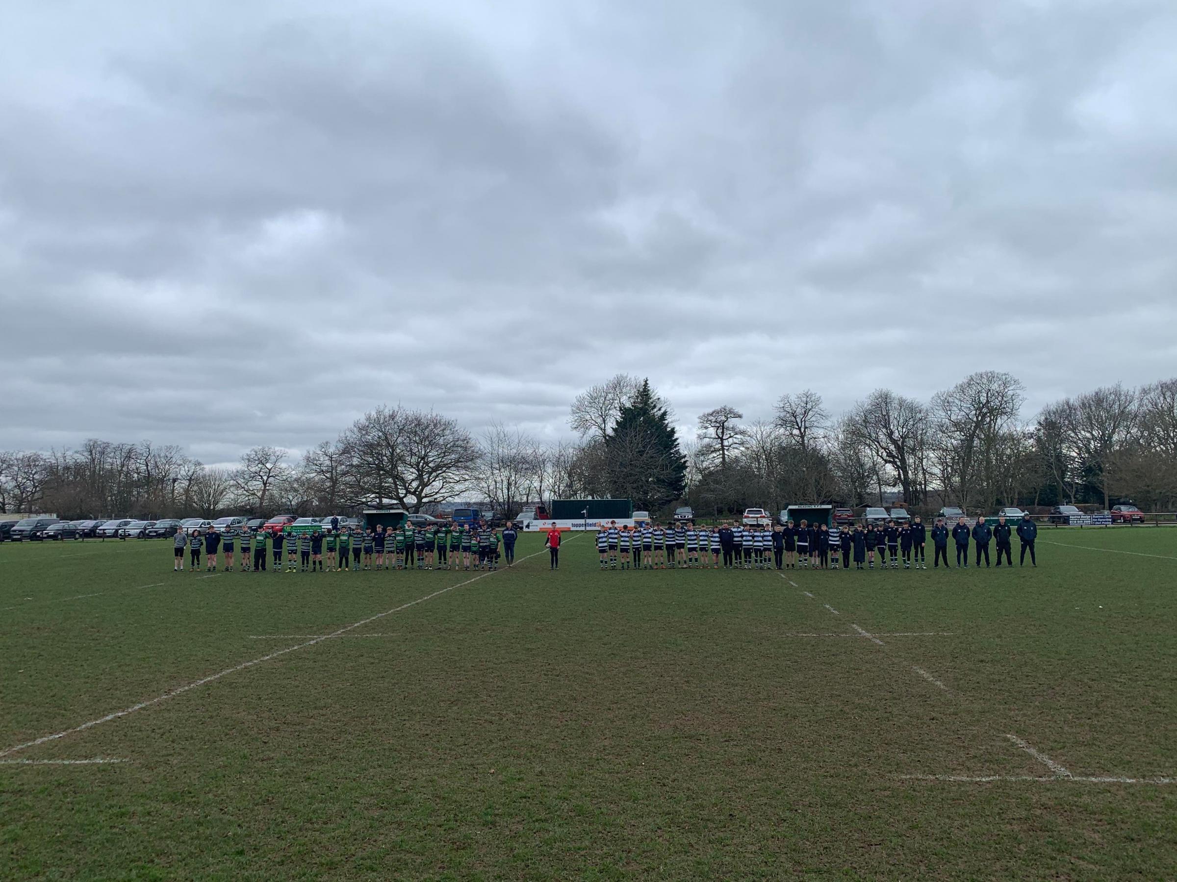 Reading Abbey and Reading Rugby Club line up at the start of the game