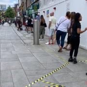Socially distanced queueing in Slough High Street