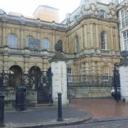 Reading Crown Court (pictured) heard that Shaun Elks launched a vicious attack on his wife