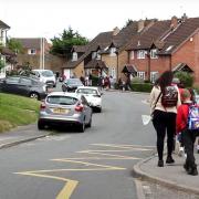 Parents and guardians walking children to Calcot Infant & Junior School. Credit: West Berkshire Council / YouTube