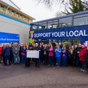 Reading buses reveal cheque from 2023 fundraising efforts