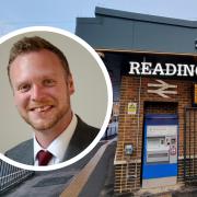Jason Brock, the leader of Reading Borough Council, celebrates the opening of the Reading West station ticket building.