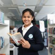 A pupil at The Wren in the library at the secondary school and sixth form in Bath Road, West Reading. Credit: The Wren, Excalibur Academies Trust