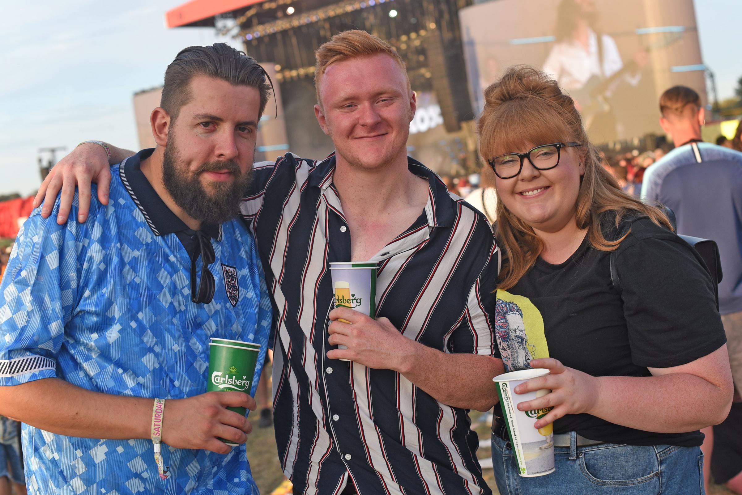 (190862) Tony Gillman, Craig Hunter and Rachel Hunter from Reading on day two of Reading Festival. Picture by Emma Sheppard.