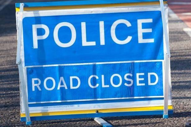 Road closed in Spencers Wood after crash 