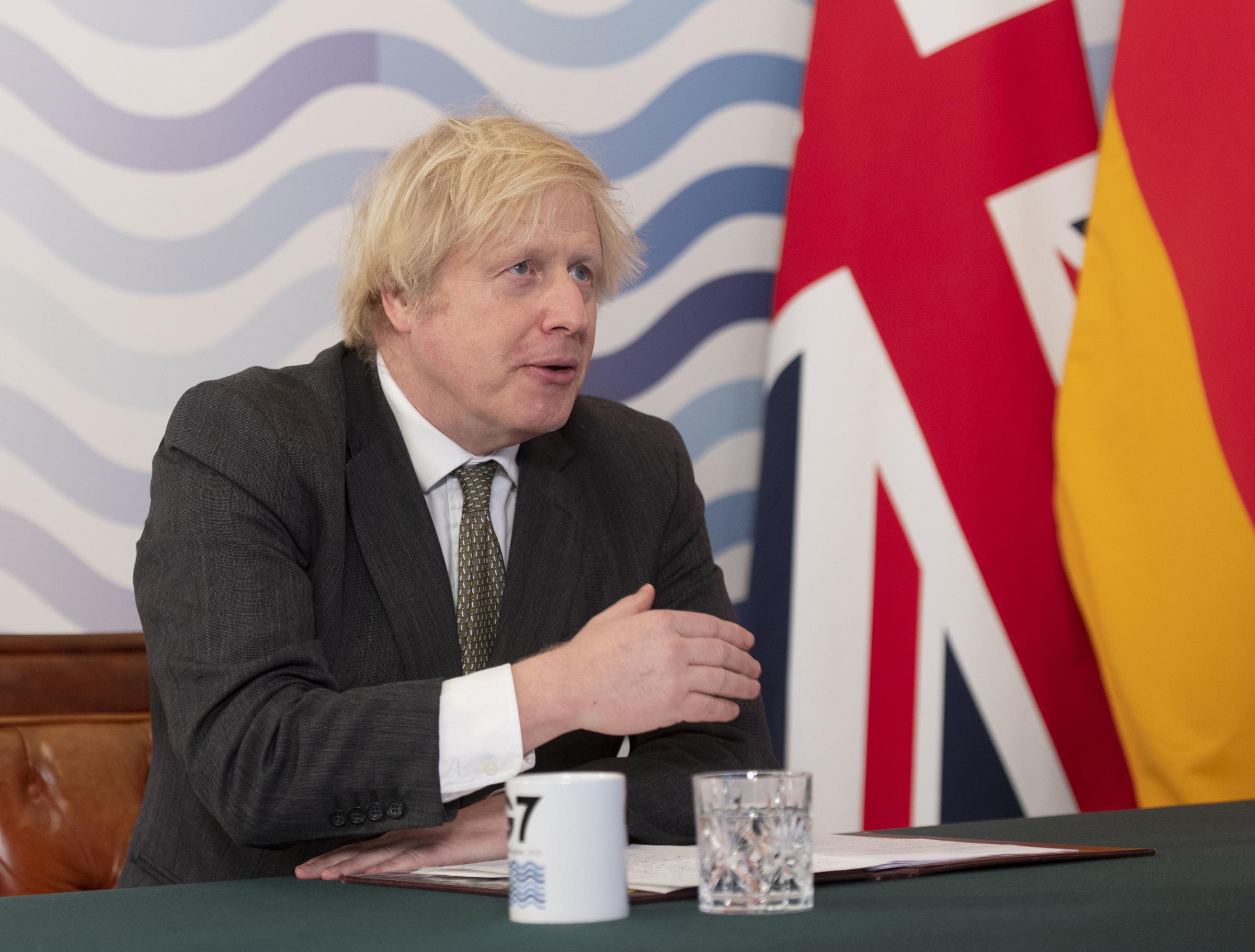 Prime Minister Boris Johnson in the Cabinet Room, Downing Street, London, hosting the G7 leaders for a virtual meeting to discuss worldwide distribtuion of coronavirus vaccines and preventing future pandemics. Picture date: Friday February 19, 2021. PA Ph