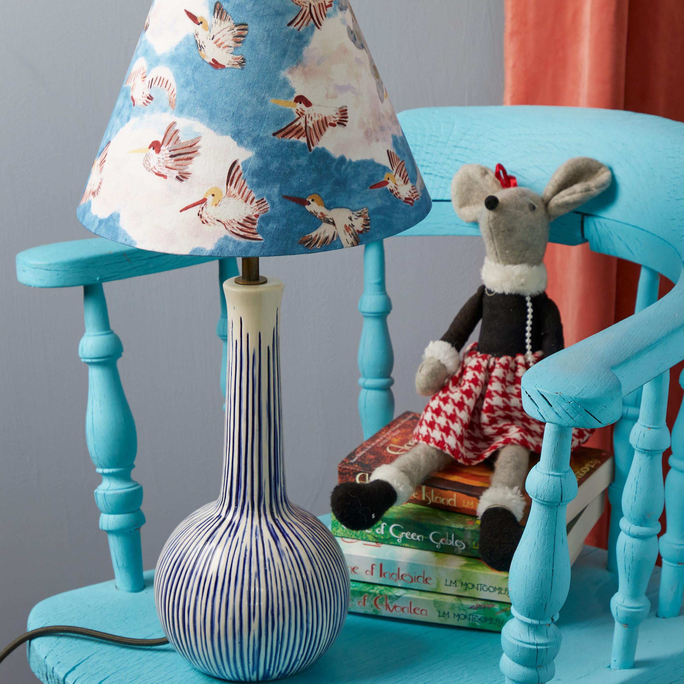 Photo of Pooky's blue and white striped Ellie table lamp, 75 (pooky.com)Pic: PA Photo/Handout