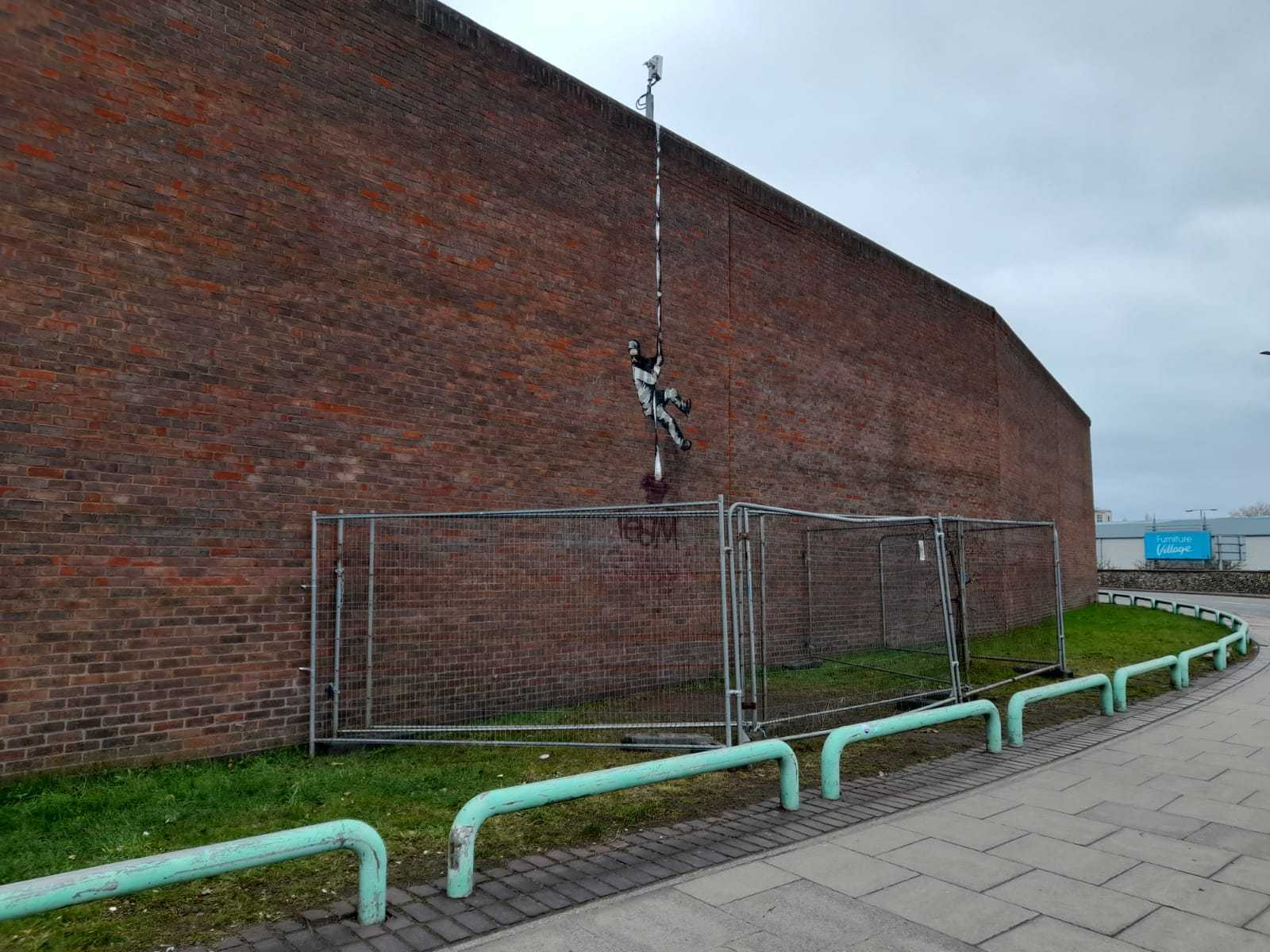 The Fenced Banksy Piece 2