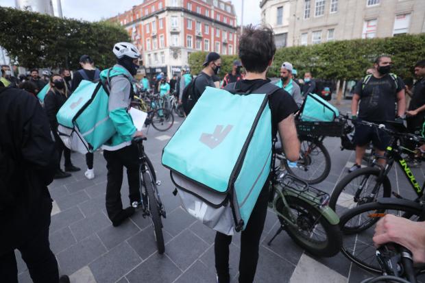 File photo dated 2/9/2020 of Deliveroo riders.