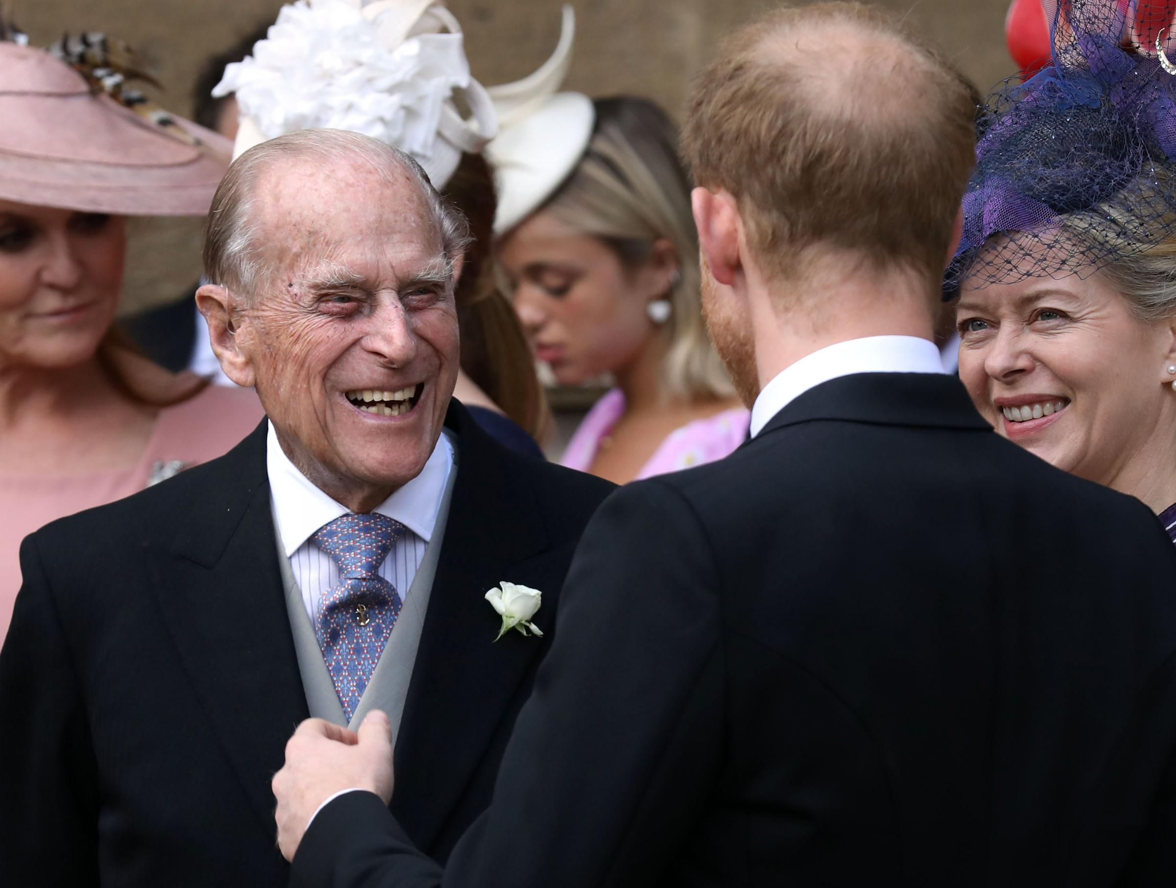 File photo dated 18/05/19 of the Duke of Edinburgh and the Duke of Sussex as they leave after the wedding of Lady Gabriella Windsor and Thomas Kingston at St Georges Chapel in Windsor Castle. James and Philip have become the new favourite names at the