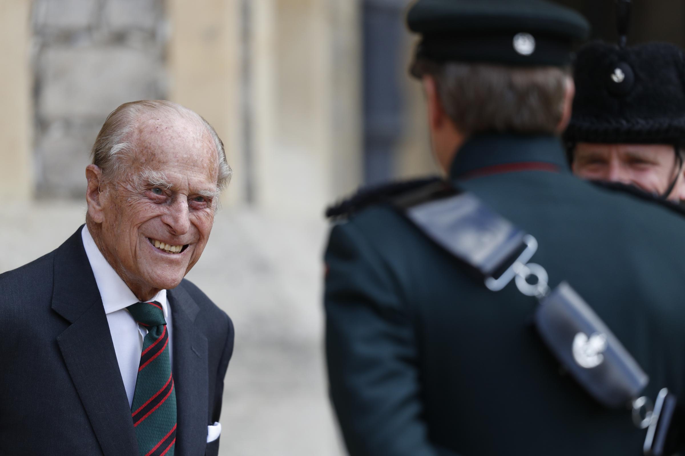The Duke of Edinburgh speaking to a bugler at Windsor Castle during a ceremony for the transfer of the Colonel-in-Chief of the Rifles from the Duke to the Duchess of Cornwall. 