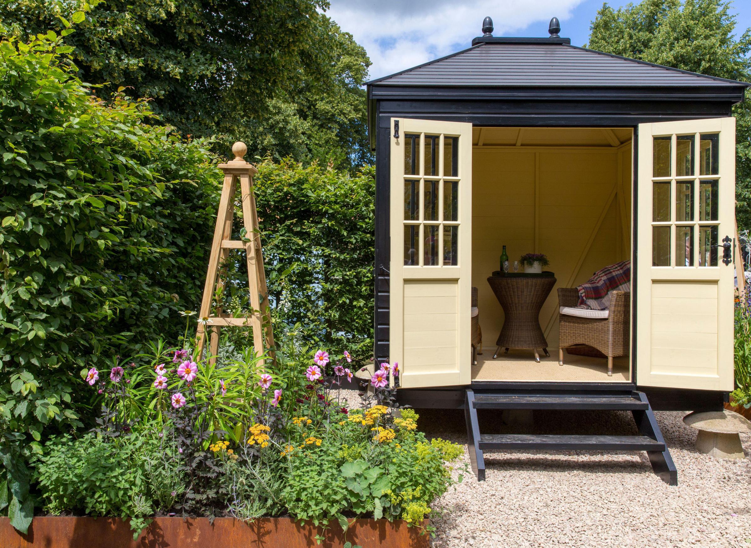 Undated Handout Photo of a small garden office in an English country garden. See PA Feature HOMES Office. Picture credit should read: Alamy/PA. WARNING: This picture must only be used to accompany PA Feature HOMES Office.