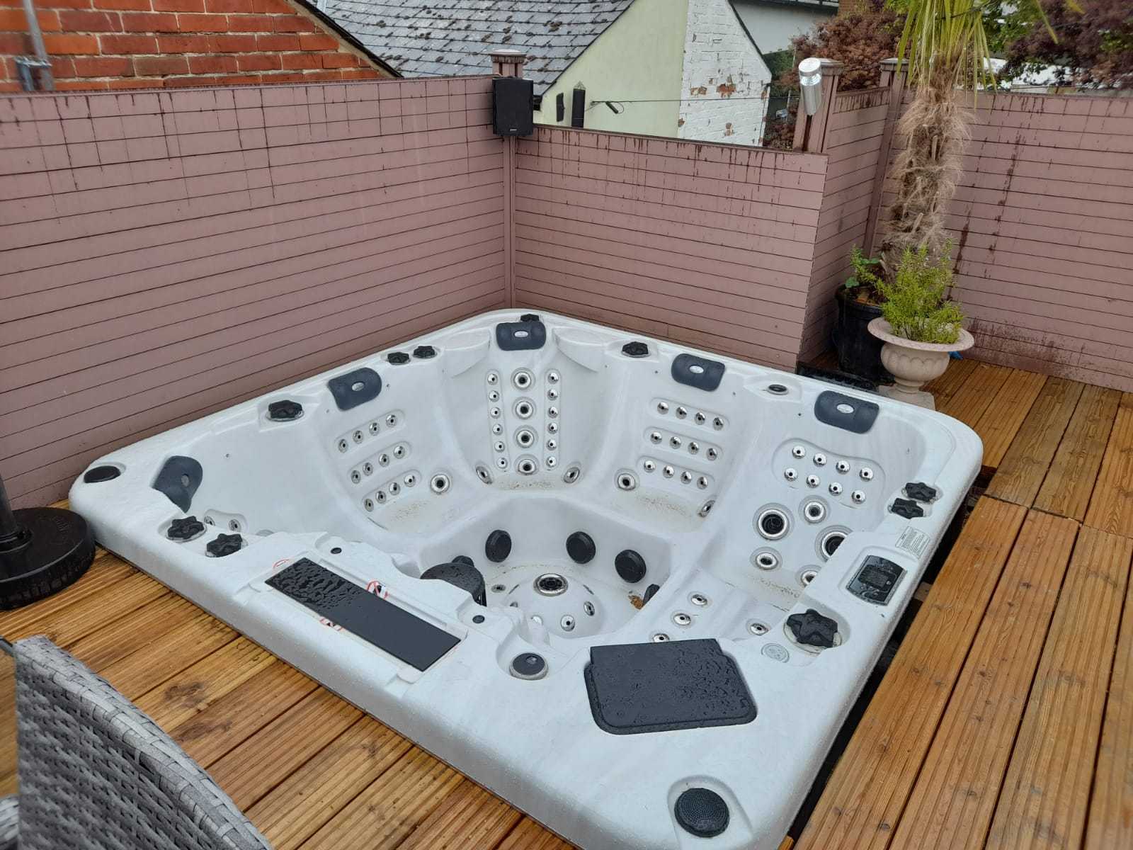 The jacuzzi, which has its own TVs
