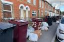 Overstuffed bins and waste bags left on the street in East Reading. Credit: James Aldridge, Local Democracy Reporting Service