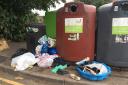Flytipping at the bottle banks at St Pau\'s Court in West Reading. Credit: Nick Fudge