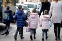 Children walking to school. Councillors have raised concerns about dangerous parking outside schools in Reading.