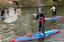 Spooky paddle-boarders snapped on the River Kennet in Reading