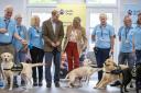 Duke and Duchess of Edinburgh train puppies at Reading guide dog centre
