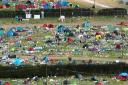 The clean-up operation still underway at the site of Reading Festival