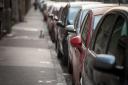 A stock image of parked cars used by Reading Borough Council