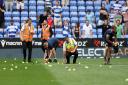 Protest Gallery: Reading fans throw hundreds of balls onto pitch during Bolton win