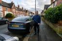Reading neighbour Tim Liddle using a Kerbo Charge cable for his Tesla. Credit: Kerbo Charge