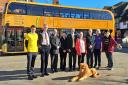 Mellow yellow: Reading mayor Tony Page, pictured second from left, was part of the congregation launching the fleet of new buses this week