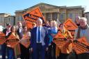 The Reading Liberal Democrats with their national party leader Sir Ed Davey outside the Royal Berkshire Hospital.