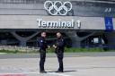 Gendarmes in front of the Charles de Gaulle airport (Thibault Camus/AP)