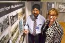 148125 Indepal Singh Dhanjal (project leader) shows Susan McCormack from Heritage Lottery Fund the Legacy of Valour exhibition in Reading Museum pic chris forsey 1/8/15 (34156452)