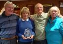 Patrick Wilmore, Lyn Pell and Rob Small receive the Portuguese Caddy Trophy from Ola Adams