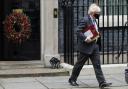 Prime Minister Boris Johnson leaves 10 Downing Street, London, to attend Prime Minister's Questions at the Houses of Parliament. Picture date: Wednesday December 15, 2021. Credit: PA