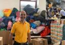 Sukhminder Dhanjal, from Reading, in front of tonnes of aid collected by the Sikh temple Ramgarhia Saba,  Reading School, and Earley residents, which he delivered to Poland with eight other drivers.