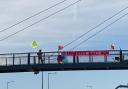 XR members banner protesting on the M4 motorway