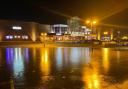 Cinema carpark transformed into ice rink after flooding from River Loddon