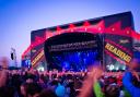 The driver attempted to ply his trade at the Reading Festival (pictured) - one of the UK's biggest music events