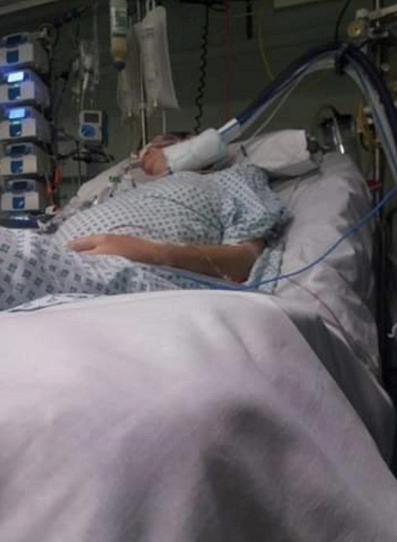 Shelly Young in hospital in a coma. See SWNS story SWBRsepsis; A mum left fighting for her life from an infection developed after giving birth is calling for lessons to be learned following NHS failures to recognize symptoms of sepsis. Shelly Young, 33,
