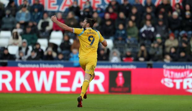 Reading Chronicle: Andy Carroll wheels away in celebration of his first Reading goal. Image by: JasonPIX.