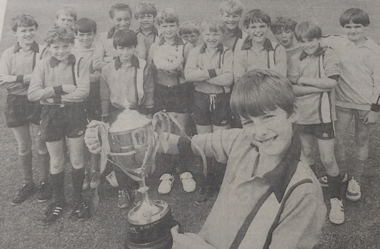 Martin Spink holding the cup as the Willowbank Junior School won the Woodley and Earley Primary Schools A League
