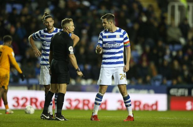 Reading Chronicle: Scott Dann vents his frustrations at referee Stephen Martin. Image by: JasonPIX