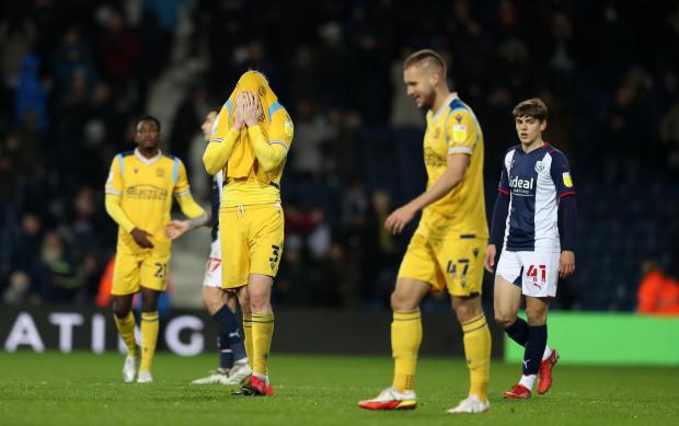 Reading Chronicle: The Reading players dejectedly trudge off the pitch after defeat to West Brom. Image by: JasonPIX