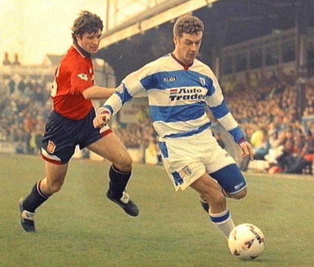Reading Chronicle: Mick Gooding up against Manchester United's Roy Keane. Image by: PA