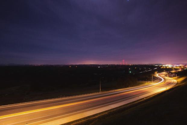 Reading Chronicle: An empty motorway at night. Credit: Canva