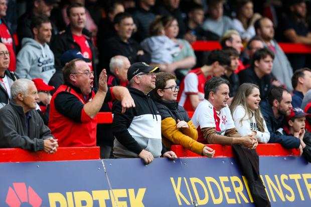 Reading Chronicle: The Kidderminster faithful watch on as their team make an unlikely FA Cup run. Image by: PA