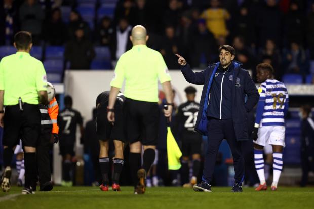 Reading Chronicle: Paunovic argues with the referee at half-time in his side's loss to Fulham. Image by: JasonPIX