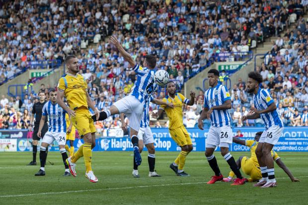 George Puscas goes for goal against Huddersfield in August. Image by: JasonPIX