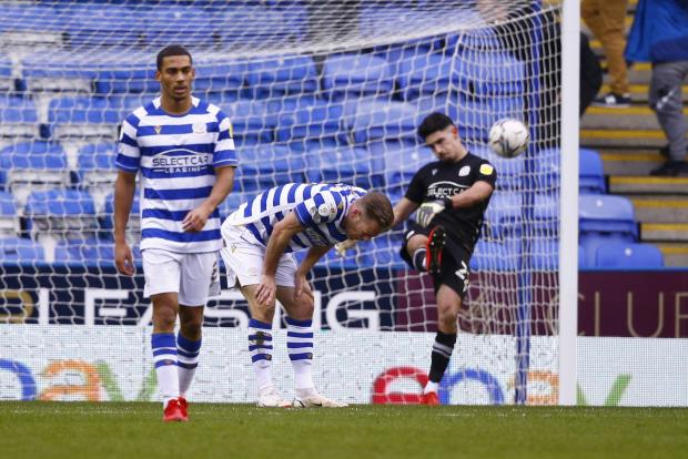 Reading Chronicle: The Reading players react to Huddersfield's second goal. Image by: JasonPIX