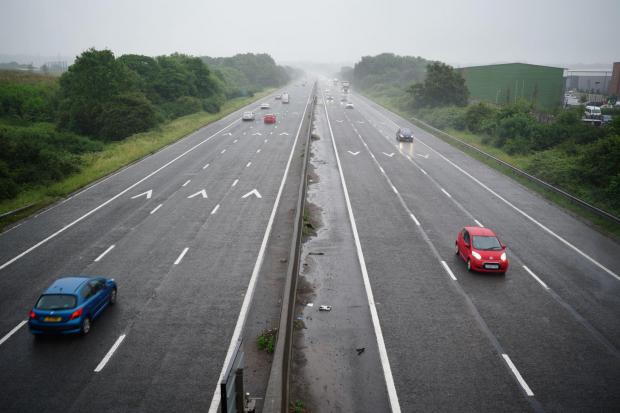 Reading Chronicle: Cars driving on a motorway. Credit: PA